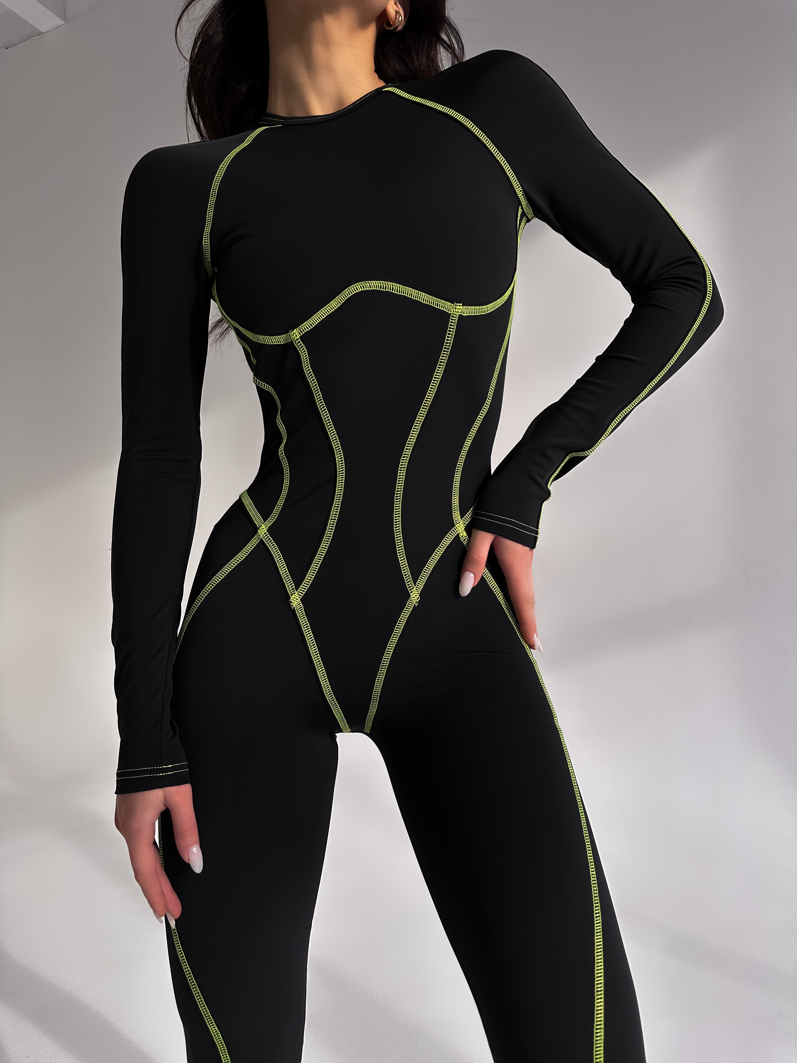 Galaxy Contour Seam Open Back Long Sleeve Jumpsuit in Black and Neon Green