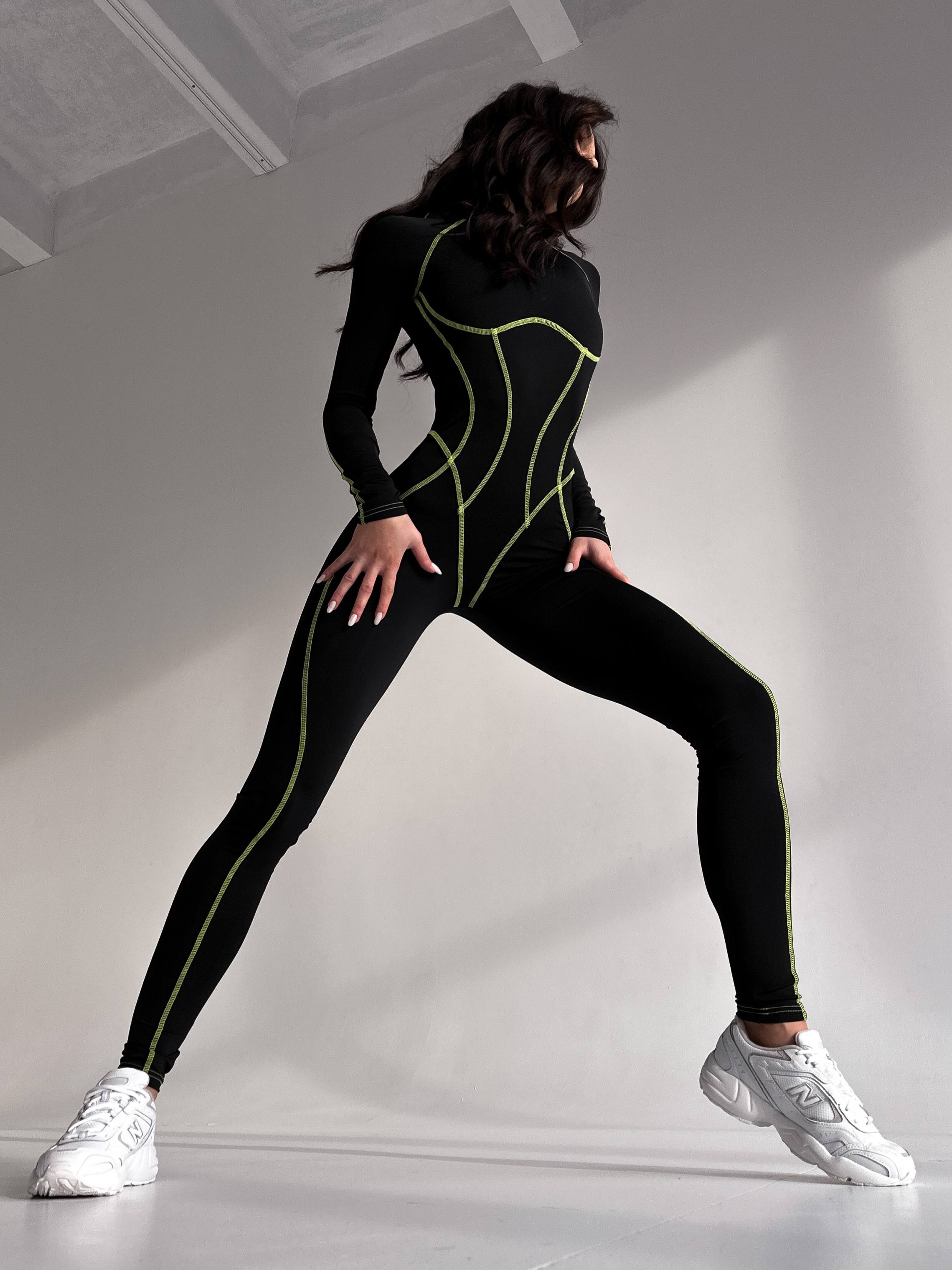 Galaxy Contour Seam Open Back Long Sleeve Jumpsuit in Black and Neon Green