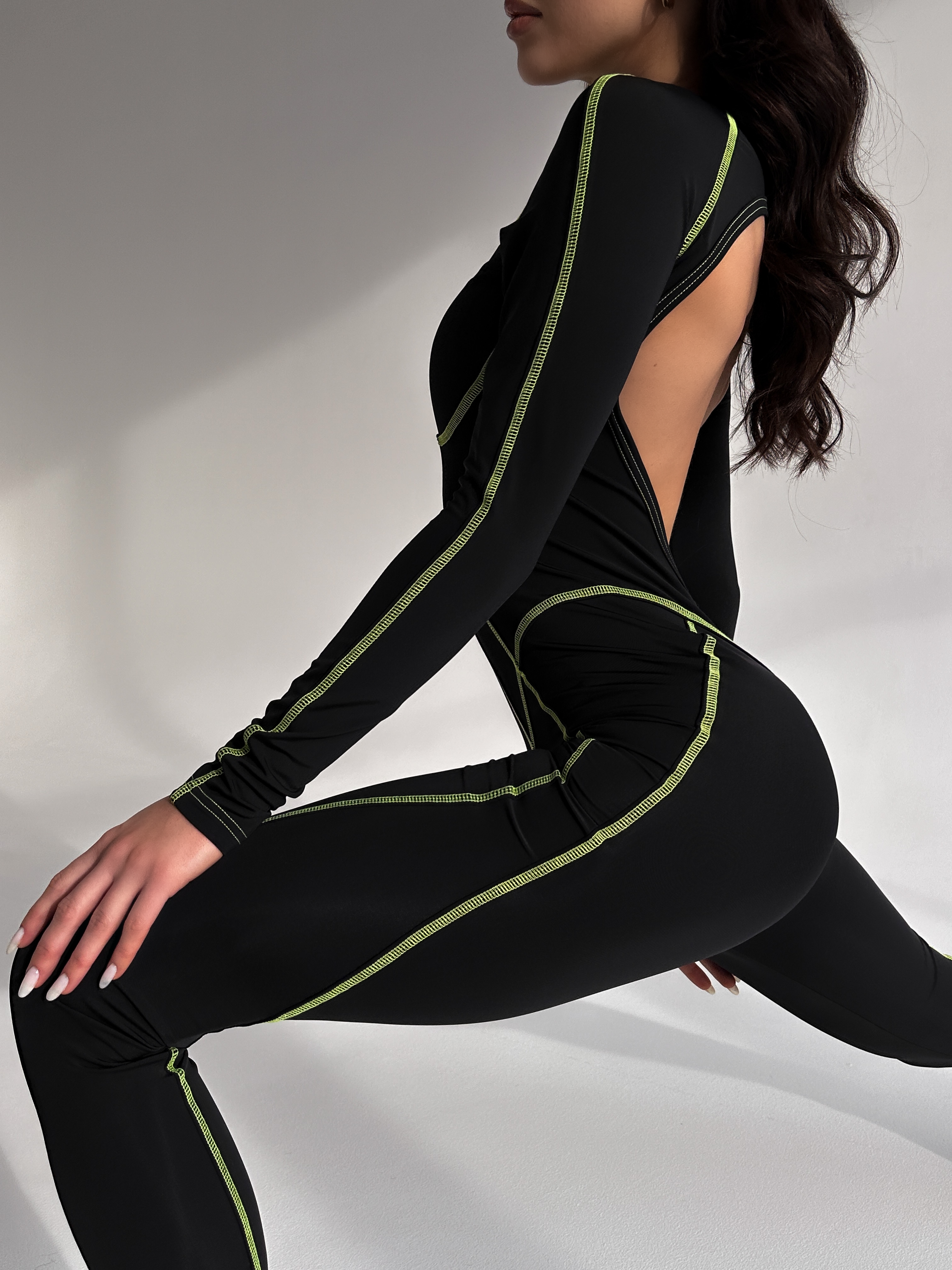 Galaxy Contour Seam Open Back Long Sleeve Jumpsuit in Black and Neon Green